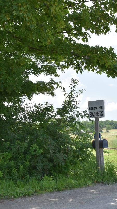 Handwoven baskets sign