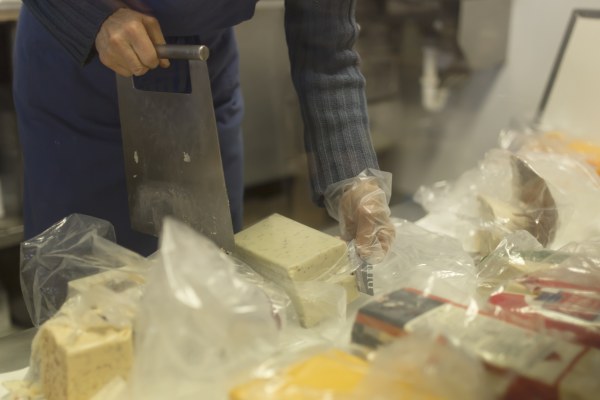 Cutting cheese at Valley View Cheese