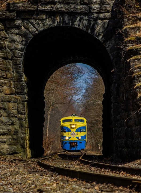 Train going through tunnel