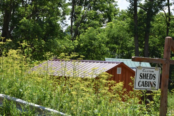Sheds and Cabins sign