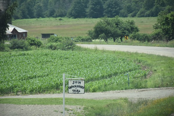 J & M Upholstrey Sign along NY's Amish Trail
