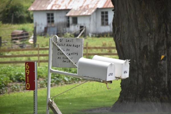 Quilt, Rugs and chair caning sign in Leon
