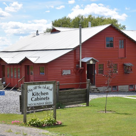 Chip Off the Oak Block Building with sign
